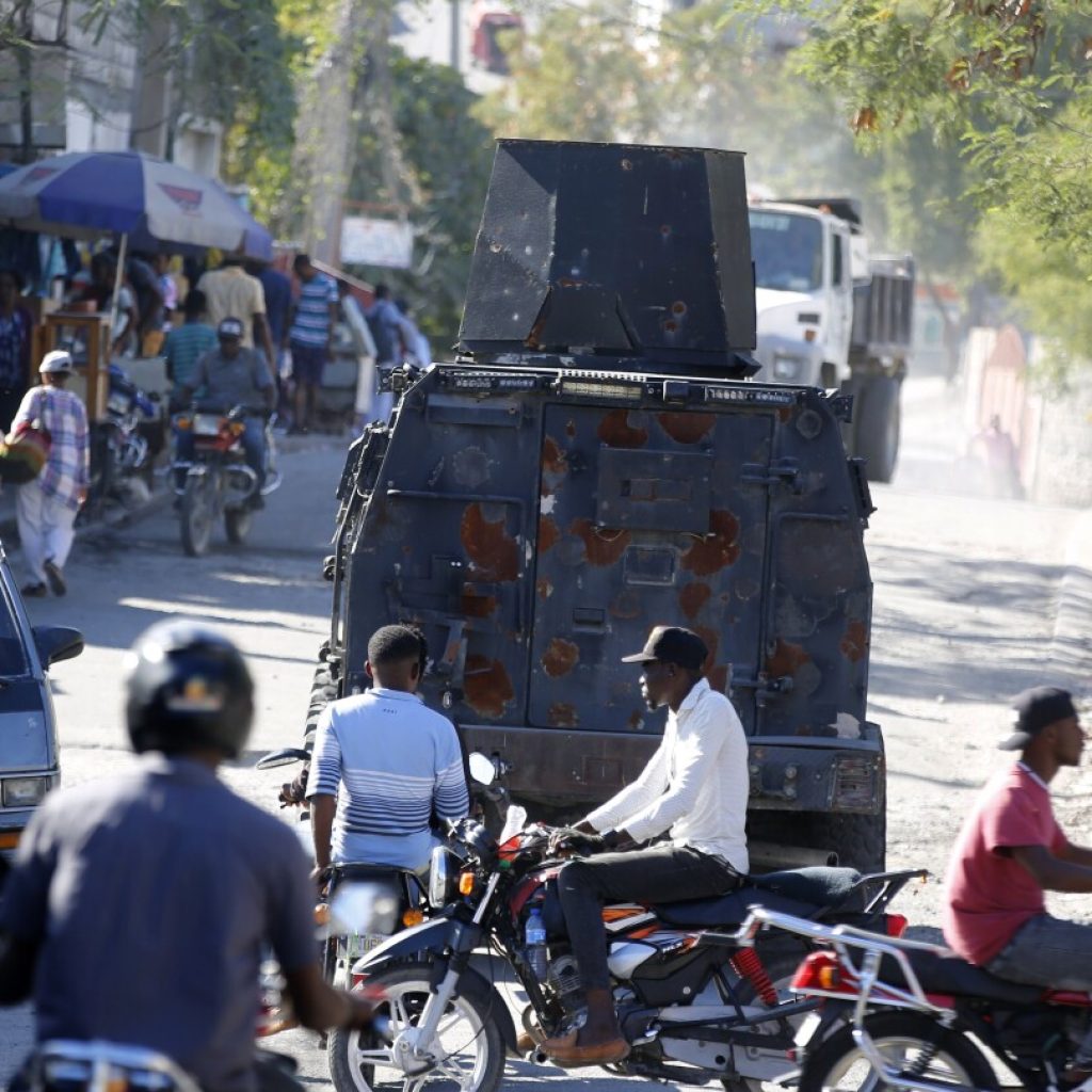 Haiti pushes forward with new program to boost police department overwhelmed by gangs | AP News