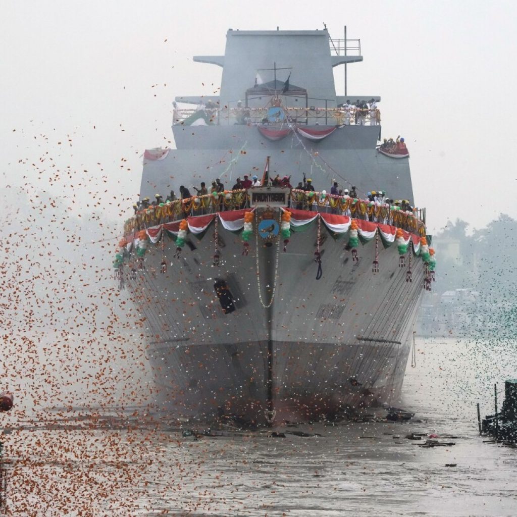 India begins flexing its naval power as China rivalry grows | AP News