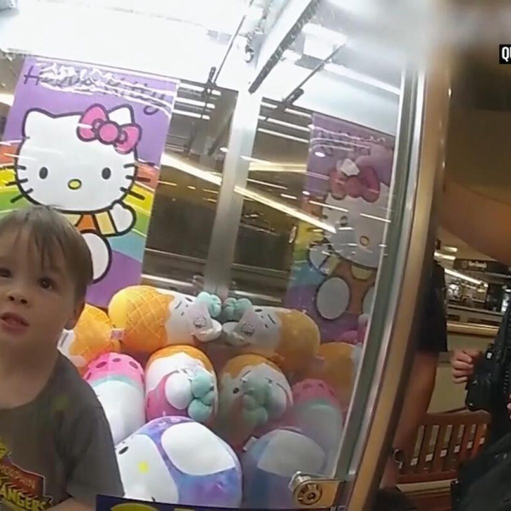 Toddler gets stuck after climbing into a claw machine looking for a toy in Australian shopping mall | AP News