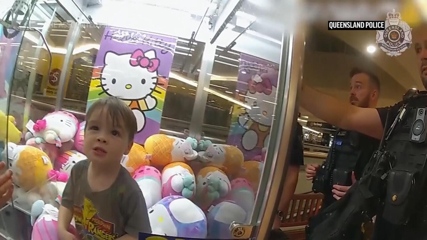 Toddler gets stuck after climbing into a claw machine looking for a toy in Australian shopping mall | AP News