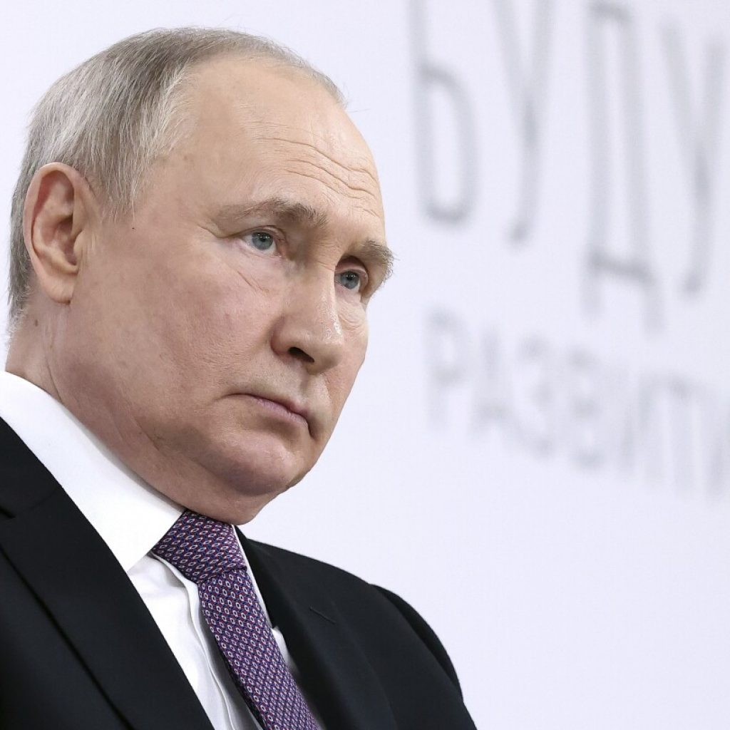 Putin casts the Ukraine conflict as a fight for Russia’s survival as he seeks reelection | AP News