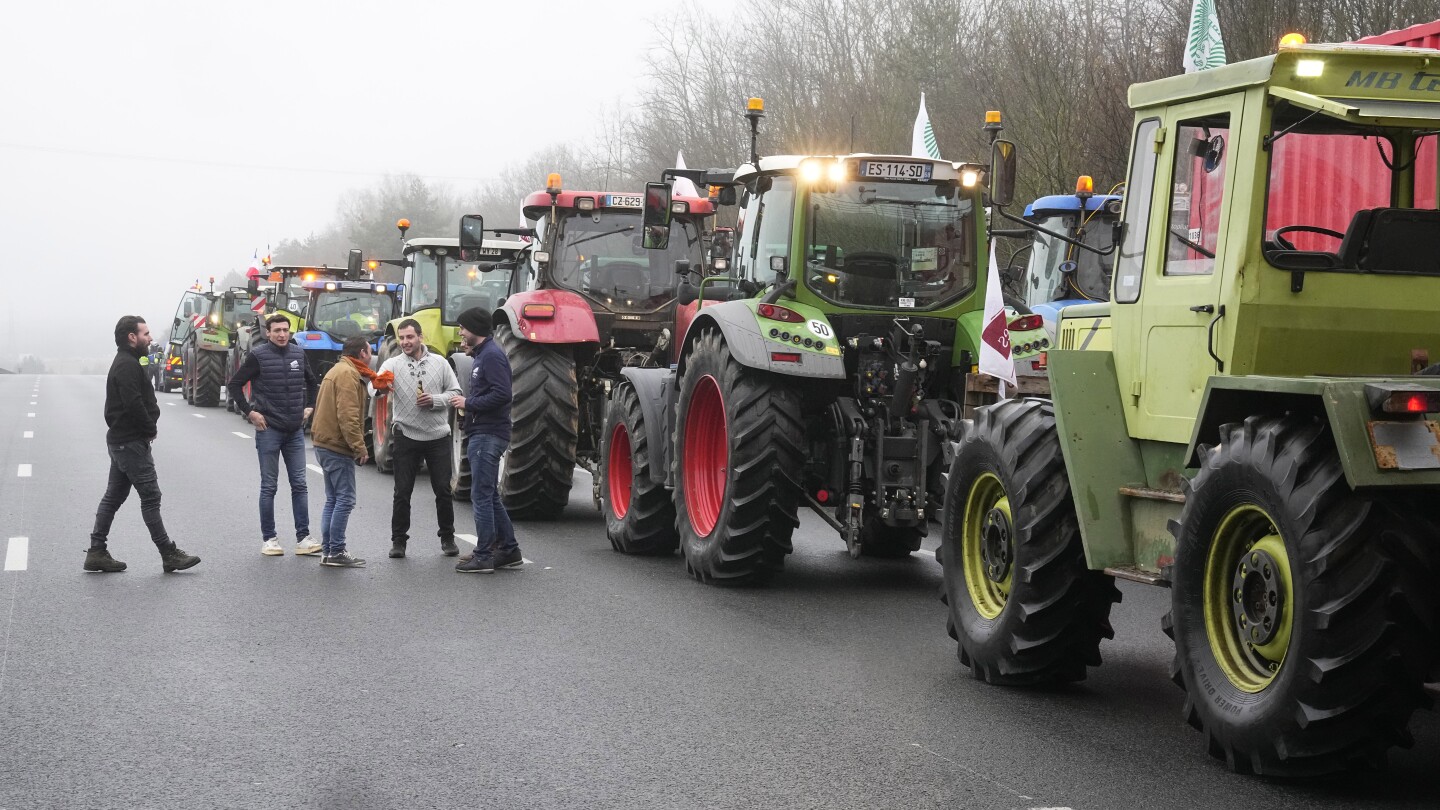 French farmers lift road blockades around Paris after the prime minister offers a support plan | AP News