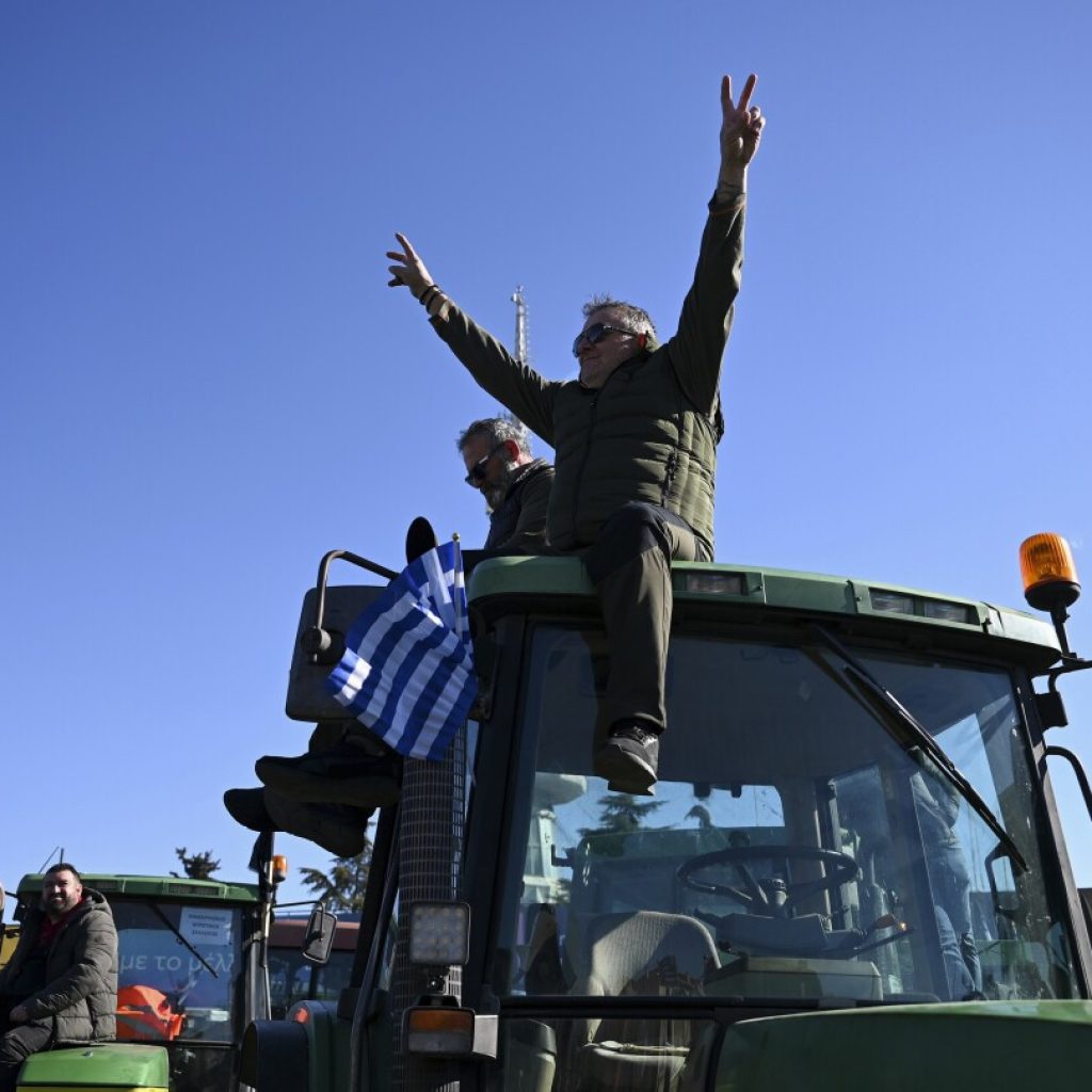 Greek farmers dump produce outside an agricultural fair and promise to escalate protests | AP News