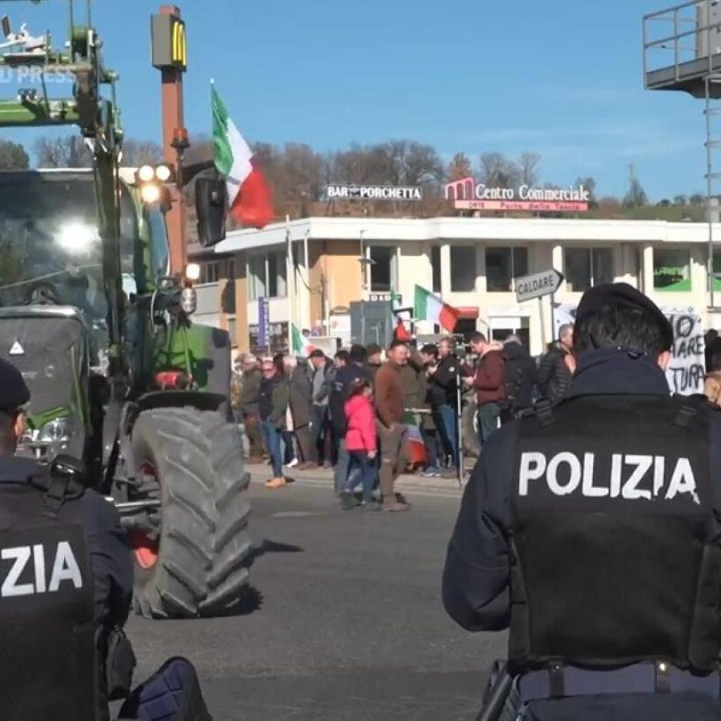 Struggling Italian cattle breeder joins tractor protest | AP News