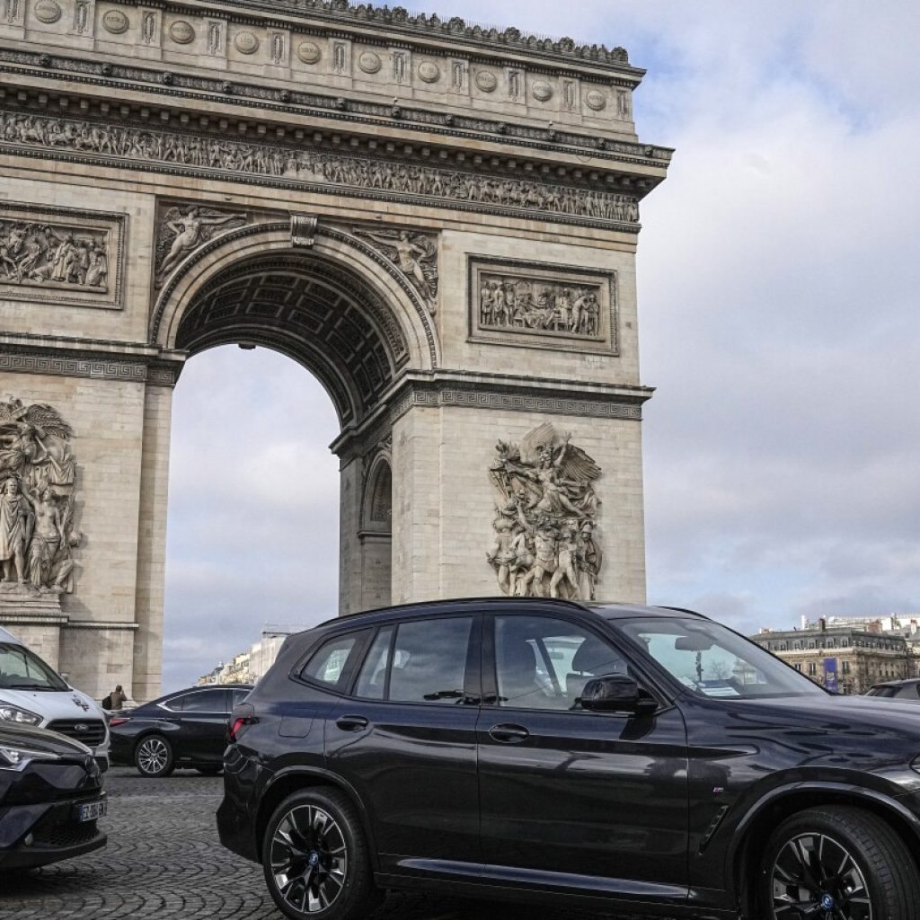 Paris votes whether to hit SUVs with eye-popping parking costs in latest green drive before Olympics | AP News