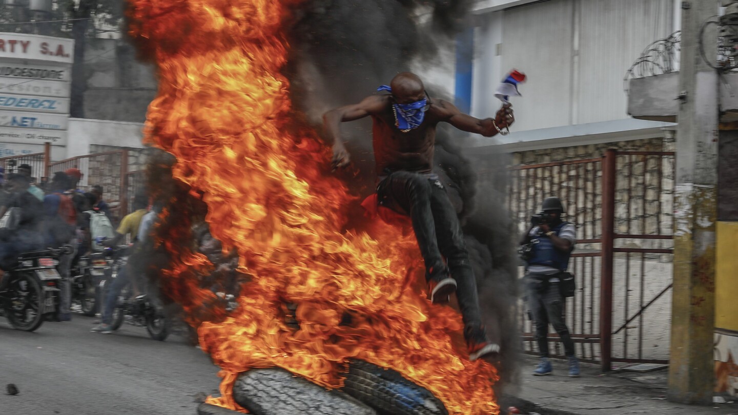 Protests erupt across Haiti as demonstrators demand that the prime minister resign | AP News