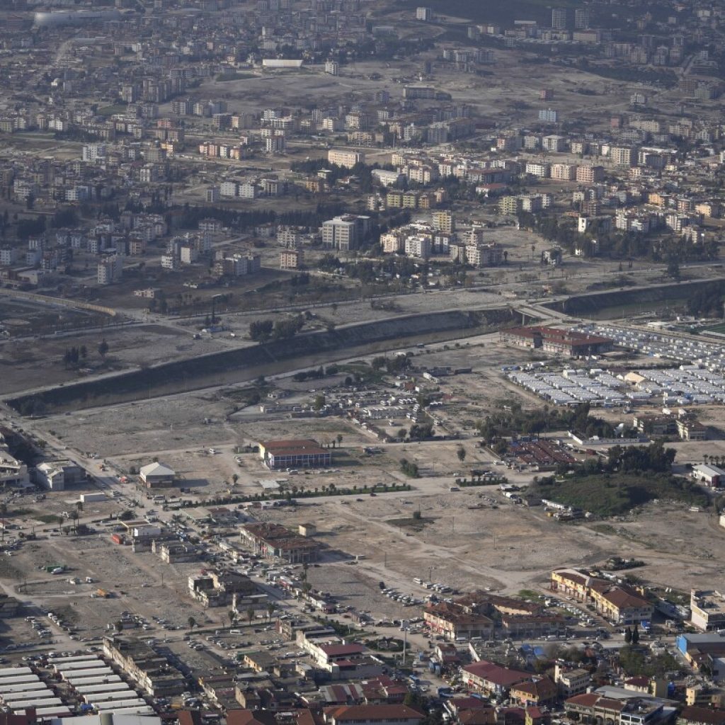 Turkey mourns tens of thousands dead, surrounded by the ruins of last year’s earthquake | AP News