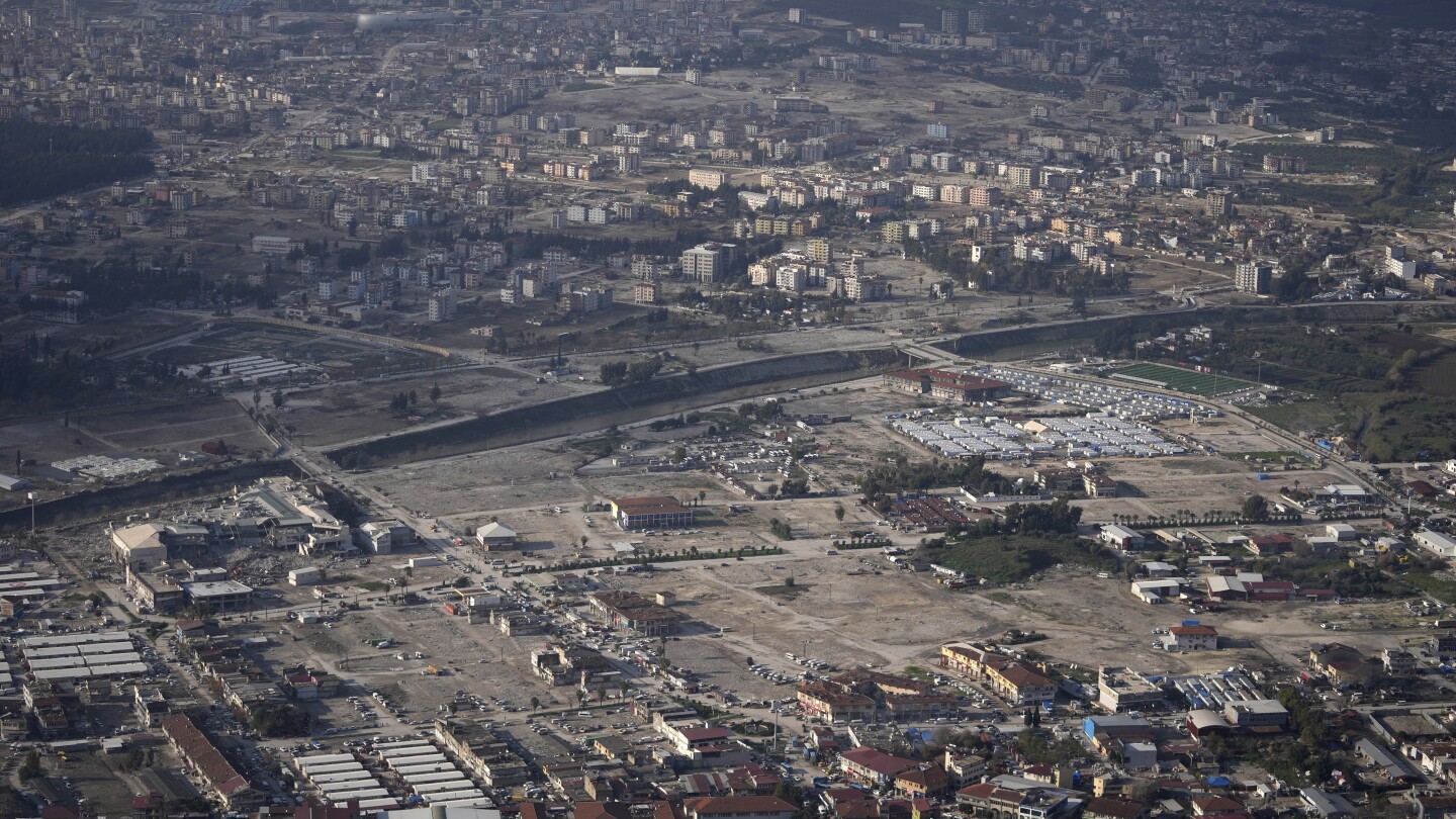 Turkey mourns tens of thousands dead, surrounded by the ruins of last year’s earthquake | AP News