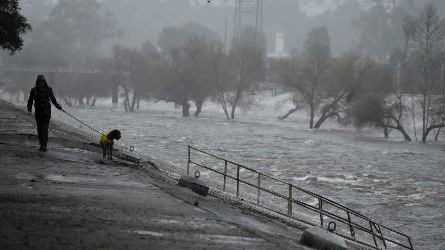 Historic rains threatens to overflow Los Angeles River  | AP News