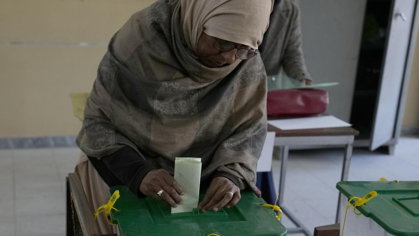 Pakistan votes for a new parliament as militant attacks surge and jailed leader’s party cries foul | AP News