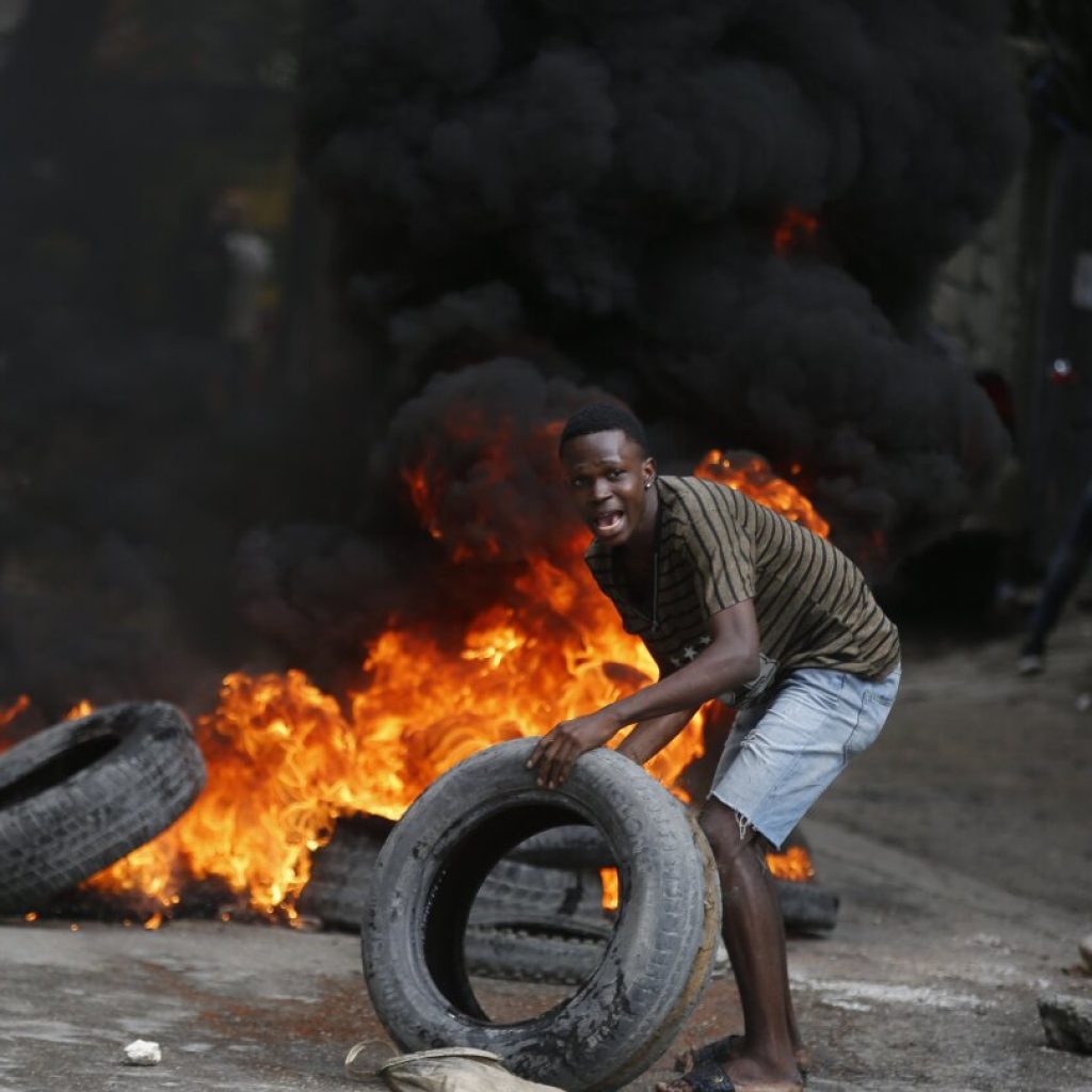 Haiti’s prime minister urges calm as violent protests seek his ouster