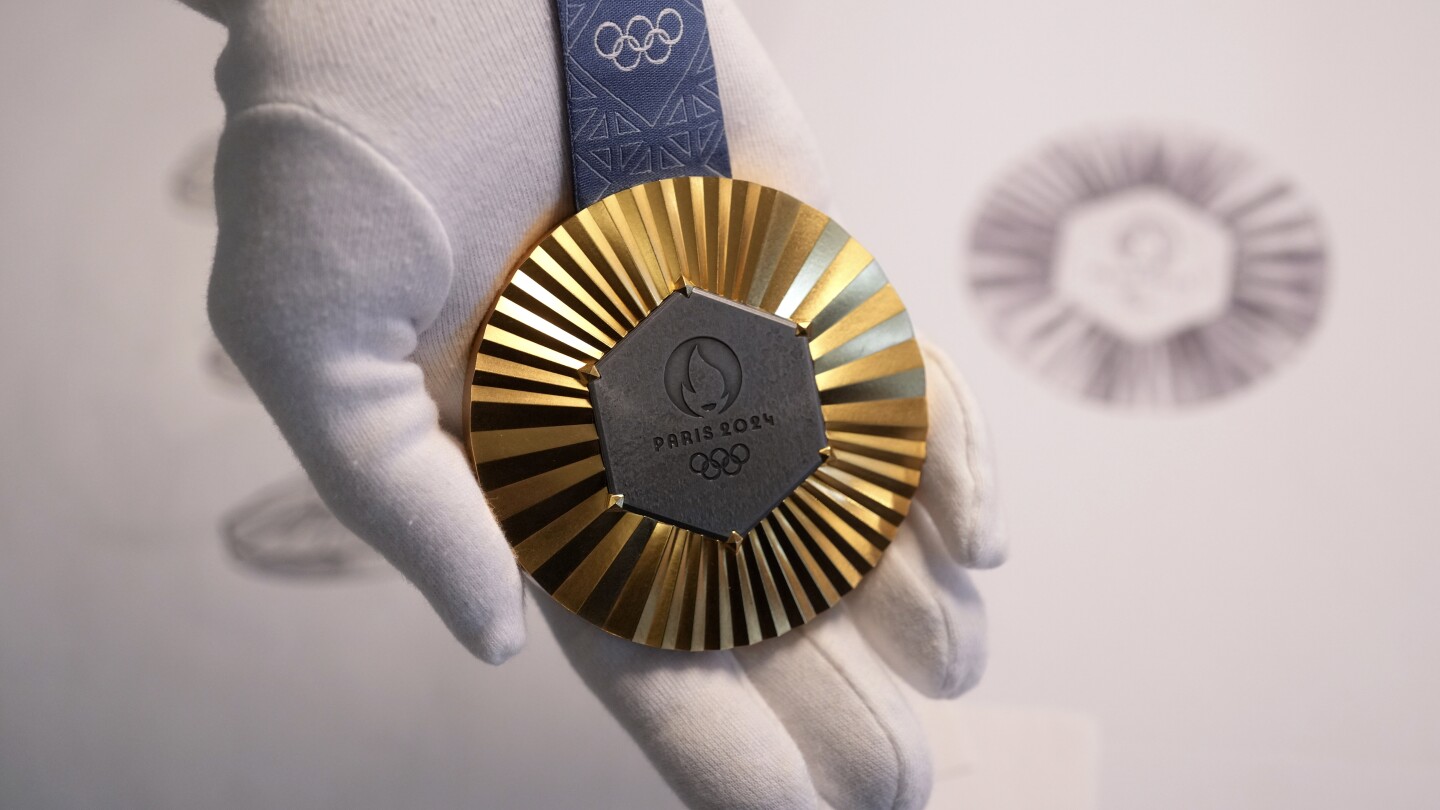 The Paris Olympics medals are monumental. They’re embedded with pieces of the Eiffel Tower