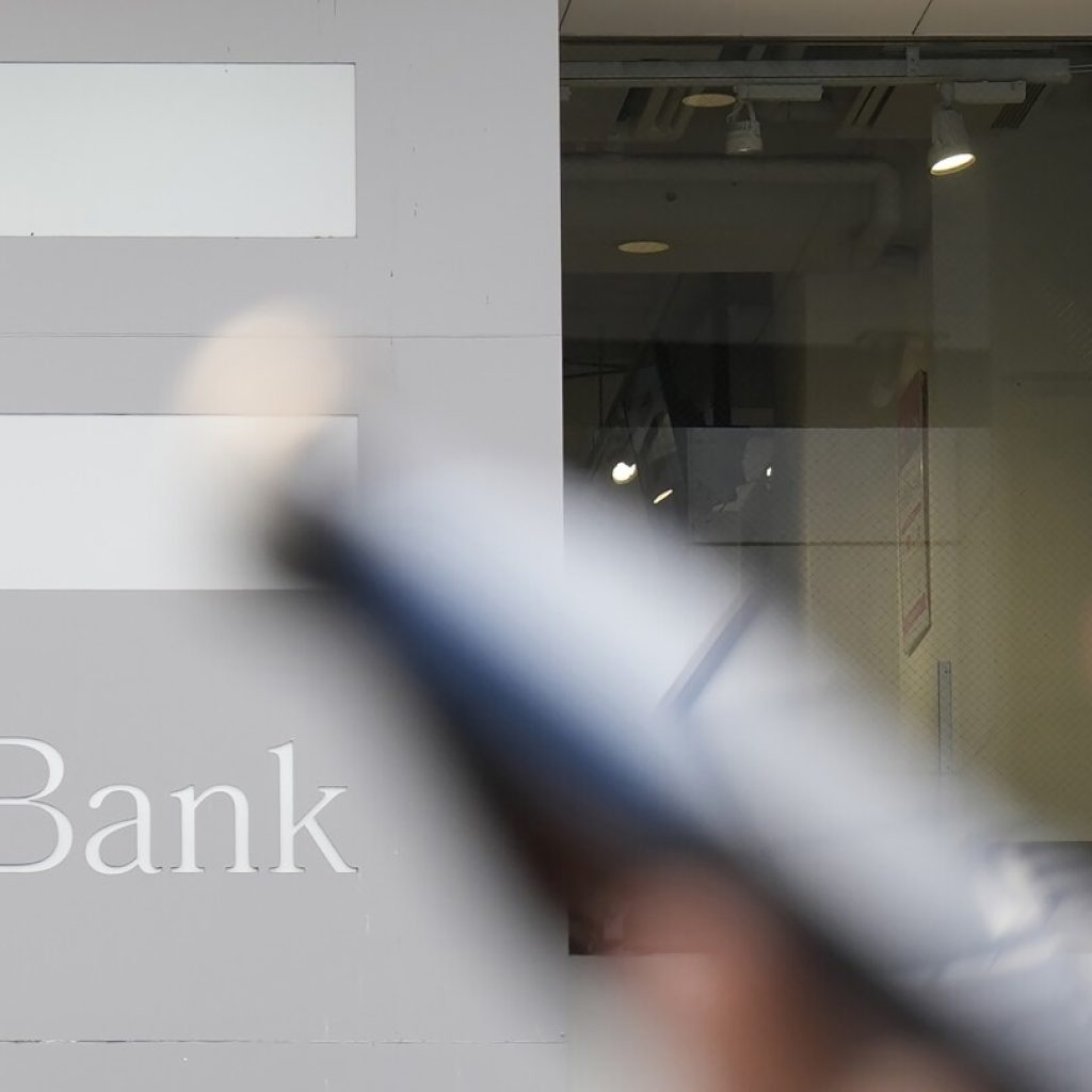 Japan’s SoftBank Group marks a return to profit as it cuts Vision Fund losses