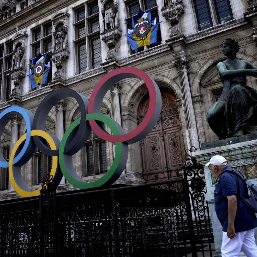 As the Olympics loom, Parisians ask: Should we skip town? Games organizers work to win their hearts