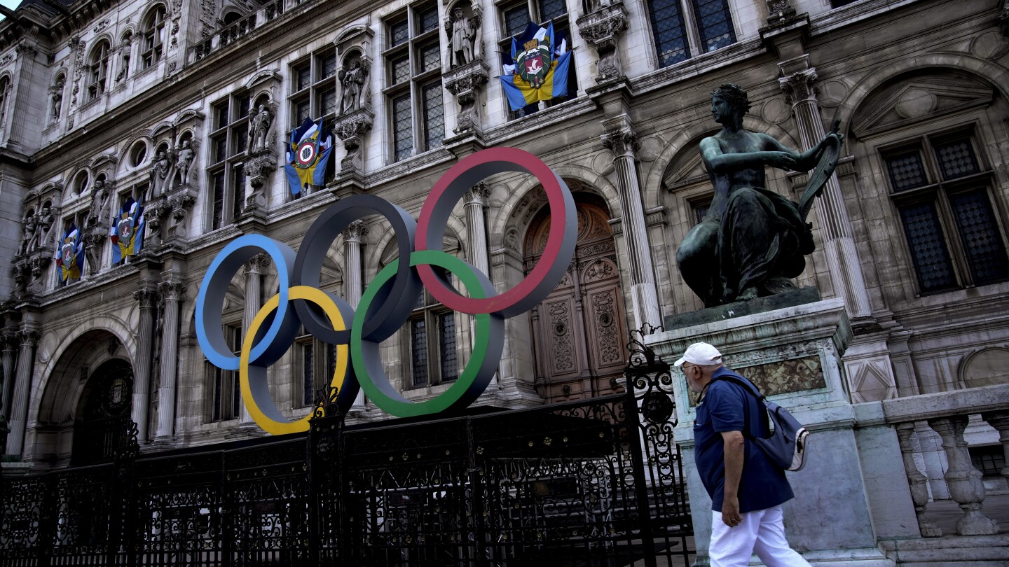 As the Olympics loom, Parisians ask: Should we skip town? Games organizers work to win their hearts