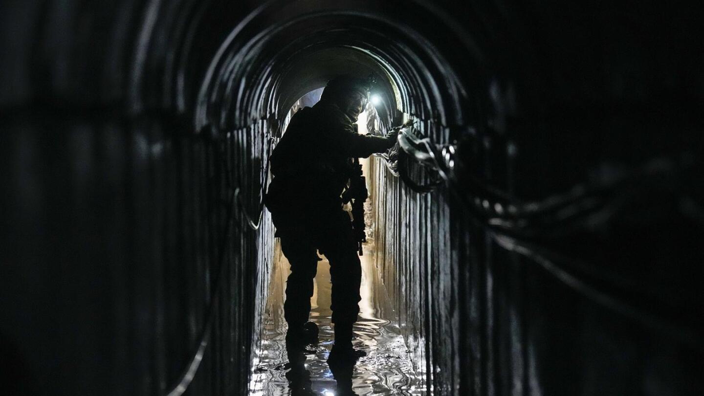 Israel shows tunnels under Gaza City headquarters of UN agency for Palestinian refugees | AP News