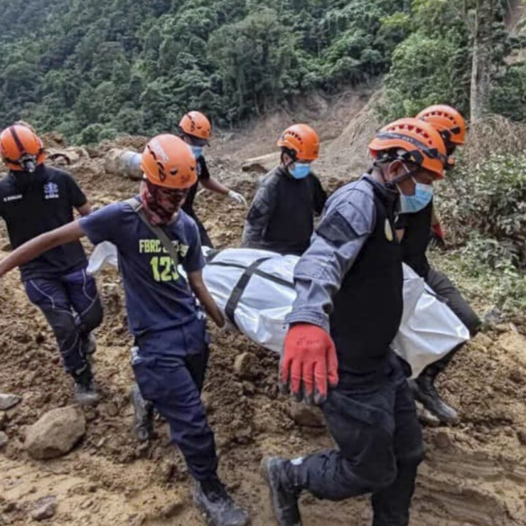 54 people are confirmed dead in a landslide that buried a gold-mining village in south Philippines