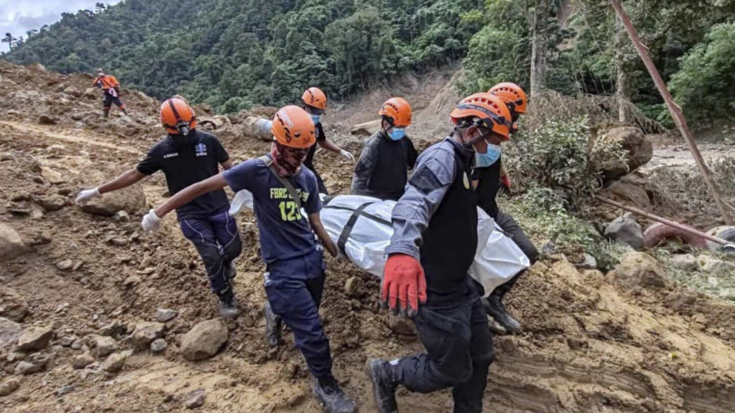 54 people are confirmed dead in a landslide that buried a gold-mining village in south Philippines