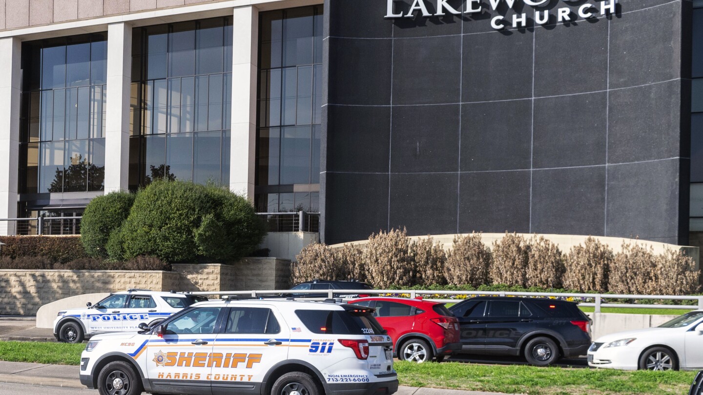 Shooter entered Texas megachurch with young son and used AR-style rifle in the attack, police say