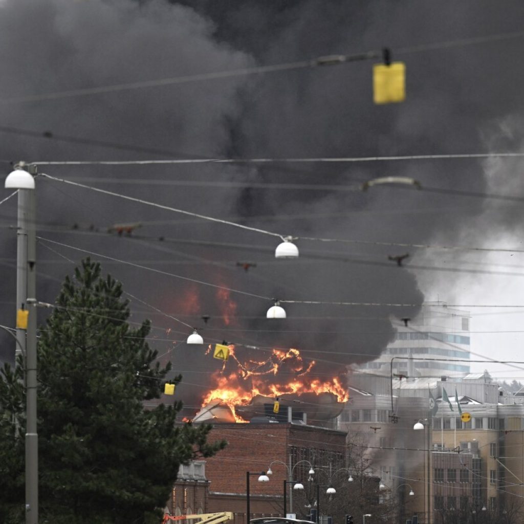 1 person missing as firefighters in Sweden struggle for second day to put out a water park fire