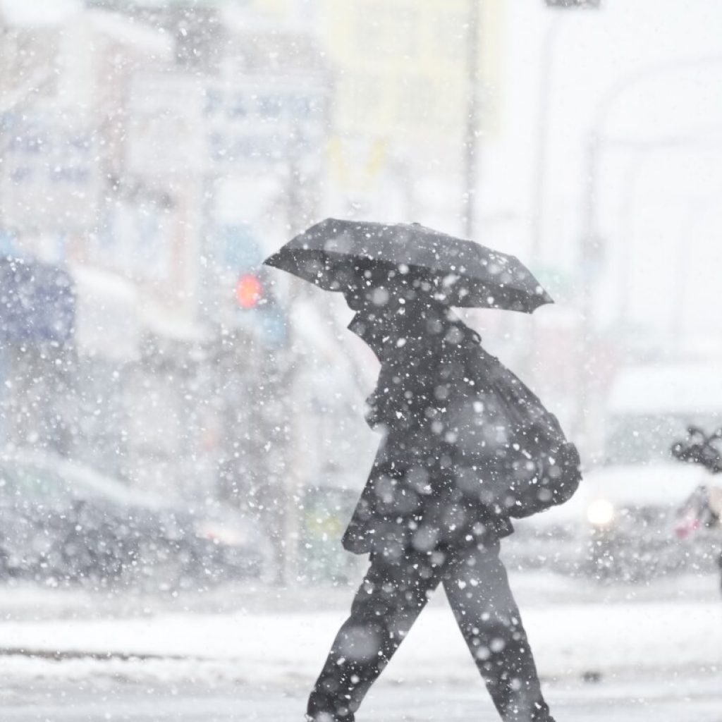 Winter storm hits Northeast, causing difficult driving, closed schools and canceled flights