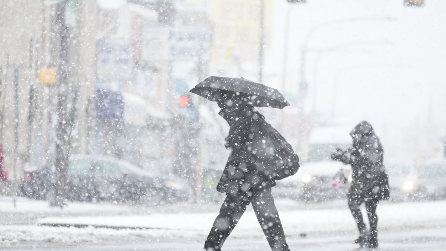 Winter storm hits Northeast, causing difficult driving, closed schools and canceled flights