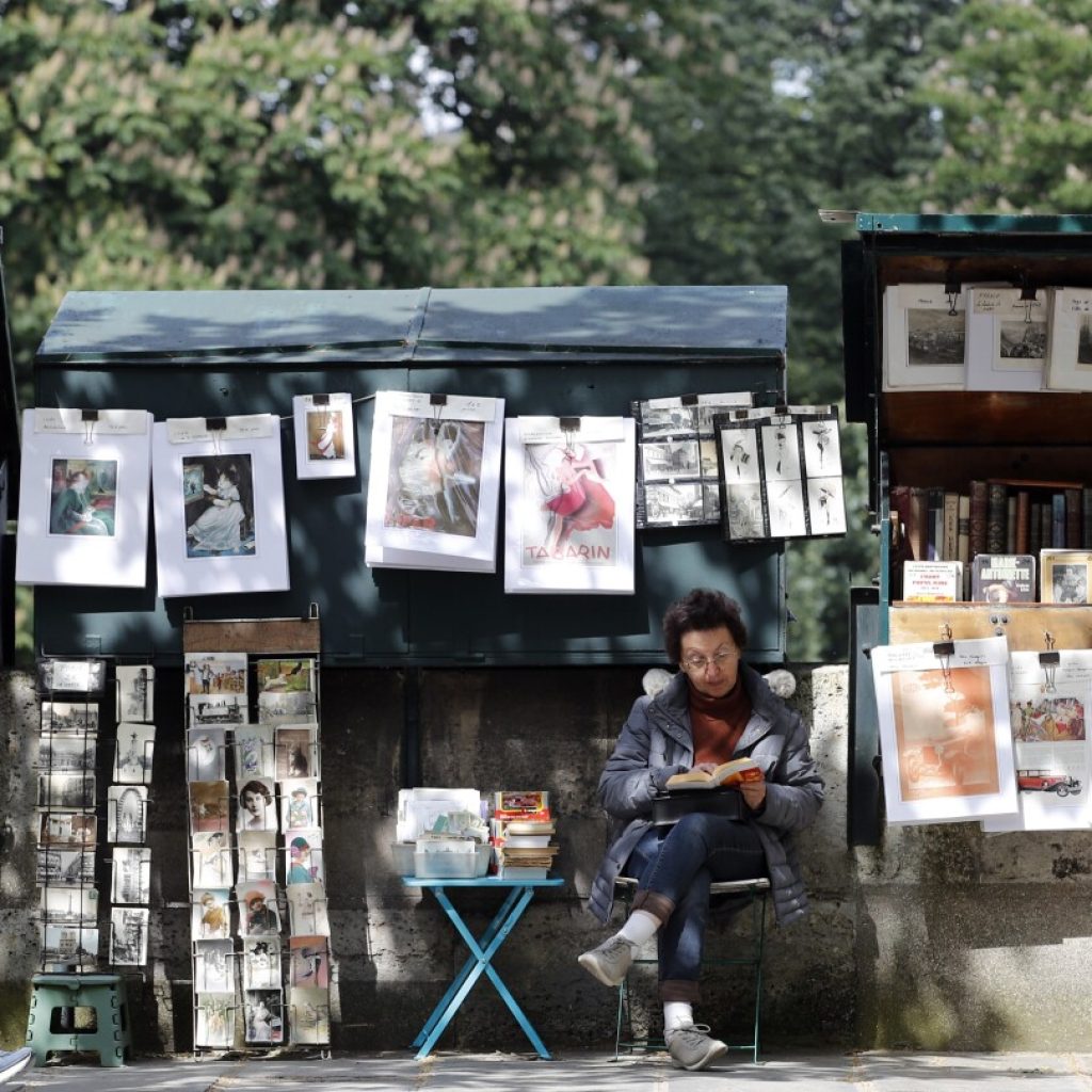 President’s intervention keeps Paris’ riverside bookstalls in place for the Olympics