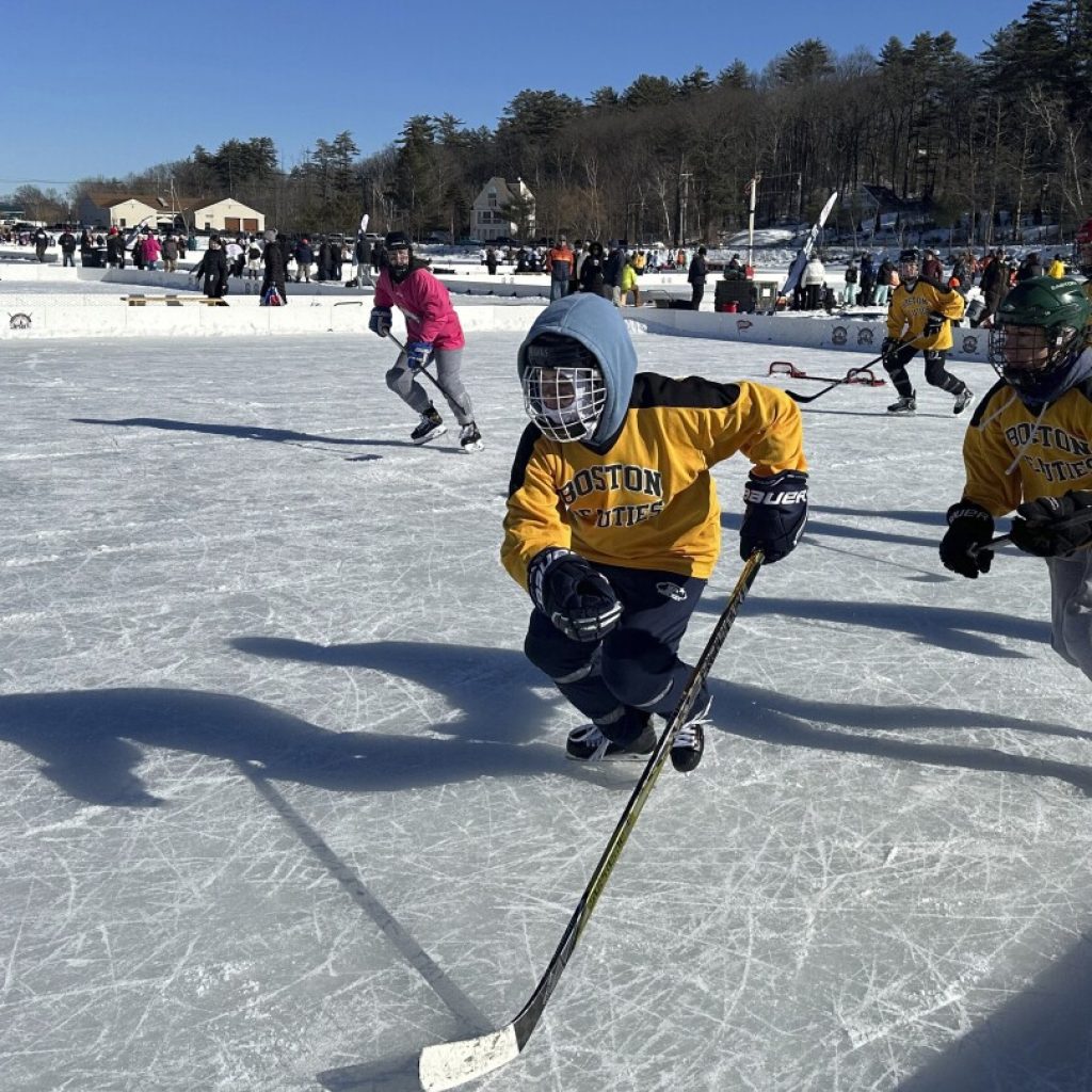 Pond hockey in New Hampshire brightens winter for hundreds. But climate change threatens the sport