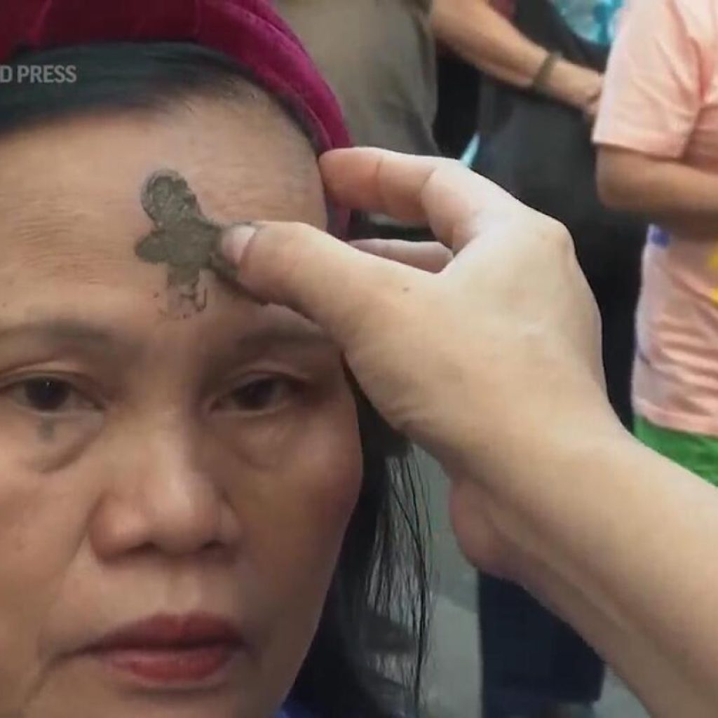 Catholics in the Philippines have their foreheads marked with ash during Ash Wednesday | AP News