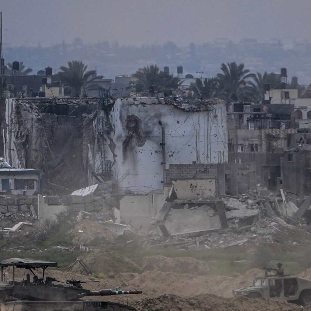 Displaced Palestinians leave one of Gaza’s main hospitals after weeks of being isolated by fighting