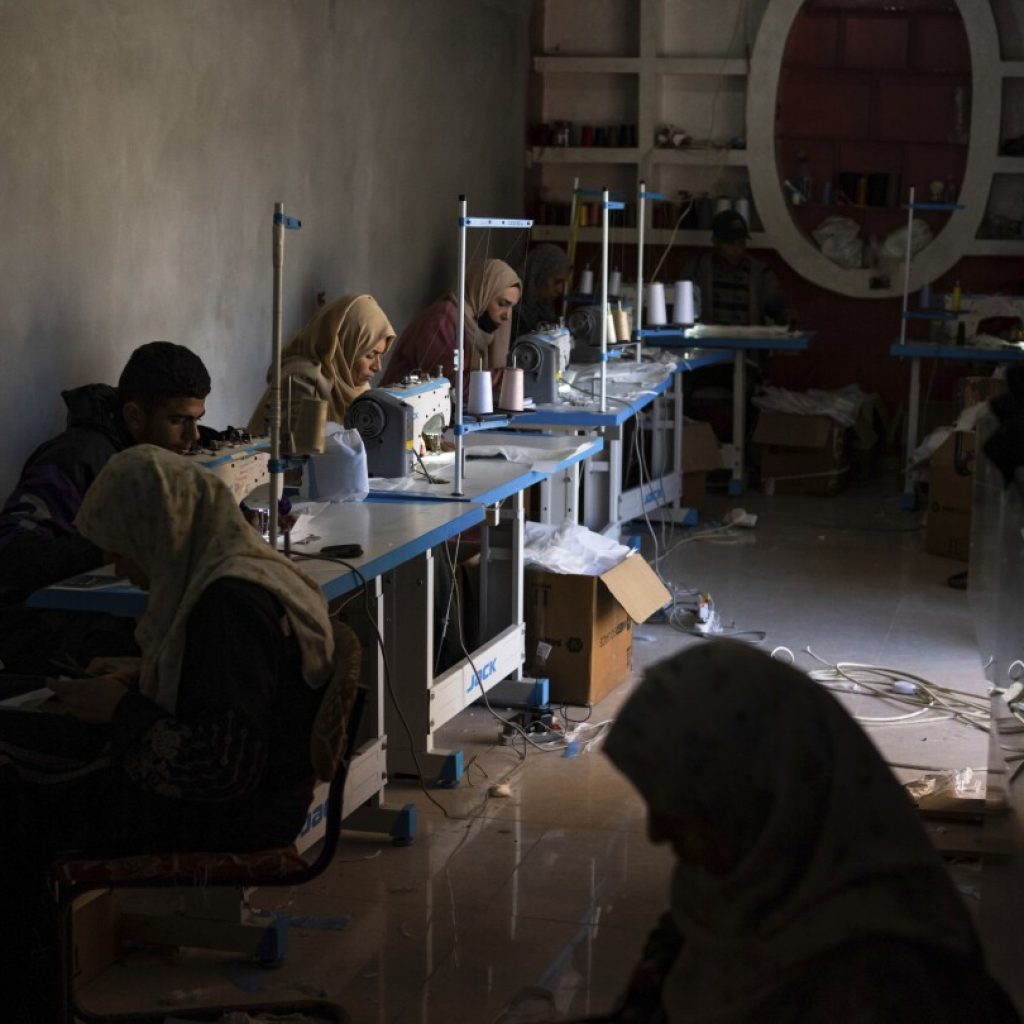 A small business in war-time Gaza sews padded cloth diapers, creating jobs and helping weary parents