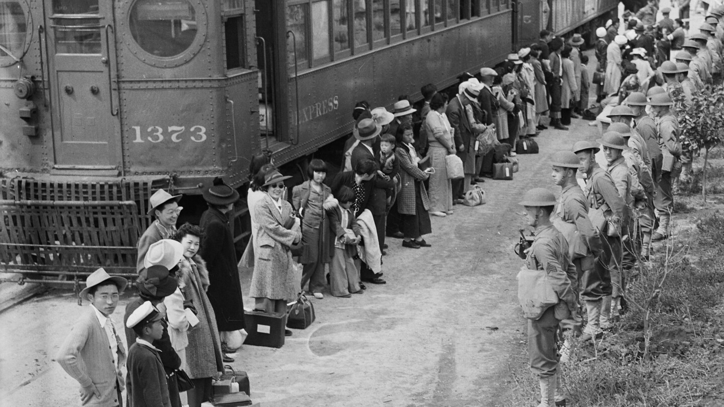 A monument honors Japanese Americans incarcerated during World War II by listing every name