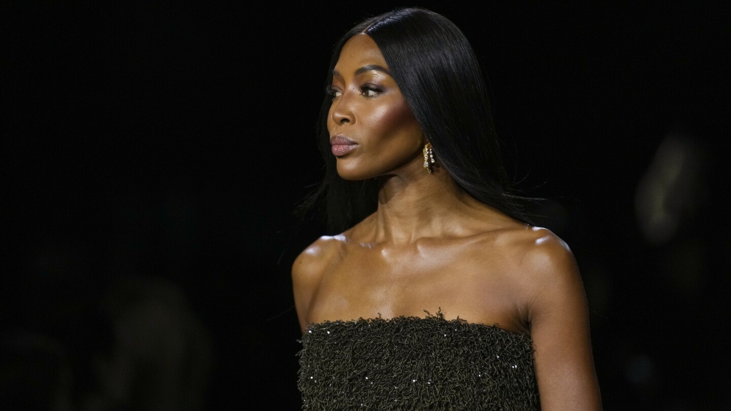 Naomi Campbell walks for star-studded Burberry show at London Fashion Week