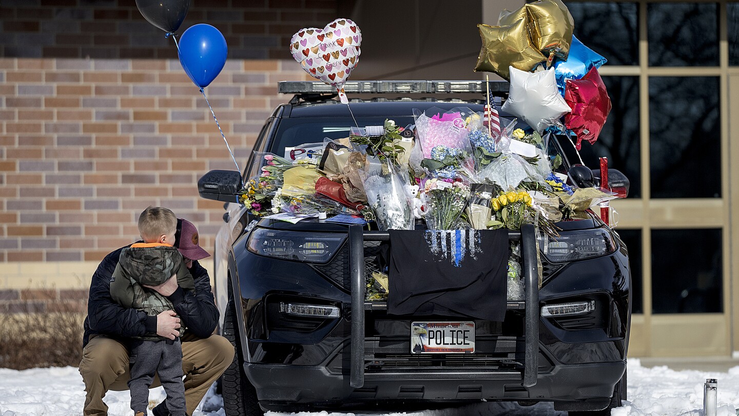 A shaken Minnesota community gets some answers on the killings of 2 officers and 1 firefighter