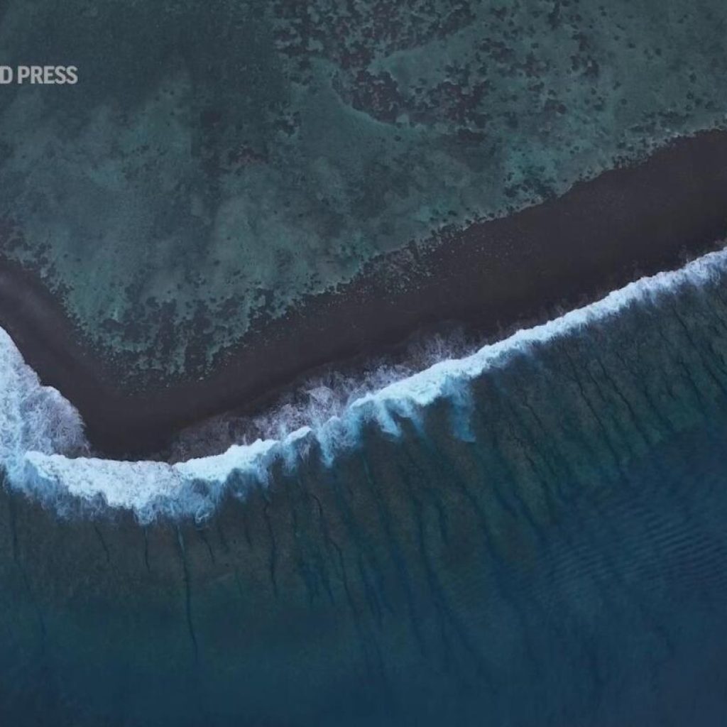 Hundreds are set to descend on Tahiti for Olympic surfing. Can locals protect their way of life? | AP News