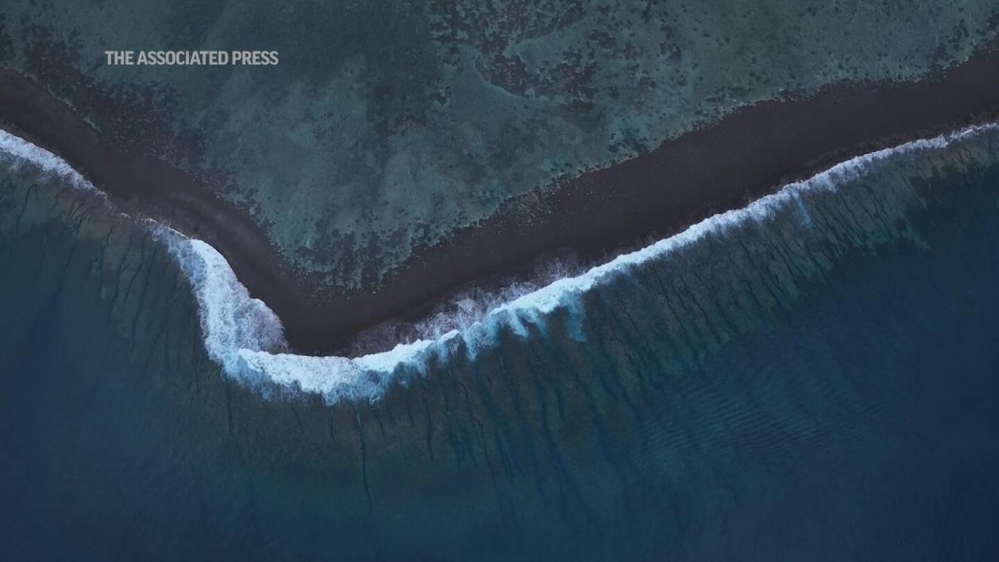 Hundreds are set to descend on Tahiti for Olympic surfing. Can locals protect their way of life? | AP News