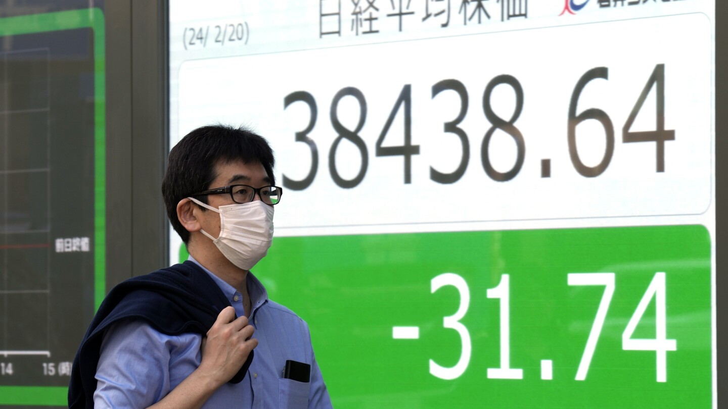 Stock market today: Asian shares trade mixed after Wall Street was closed for a holiday