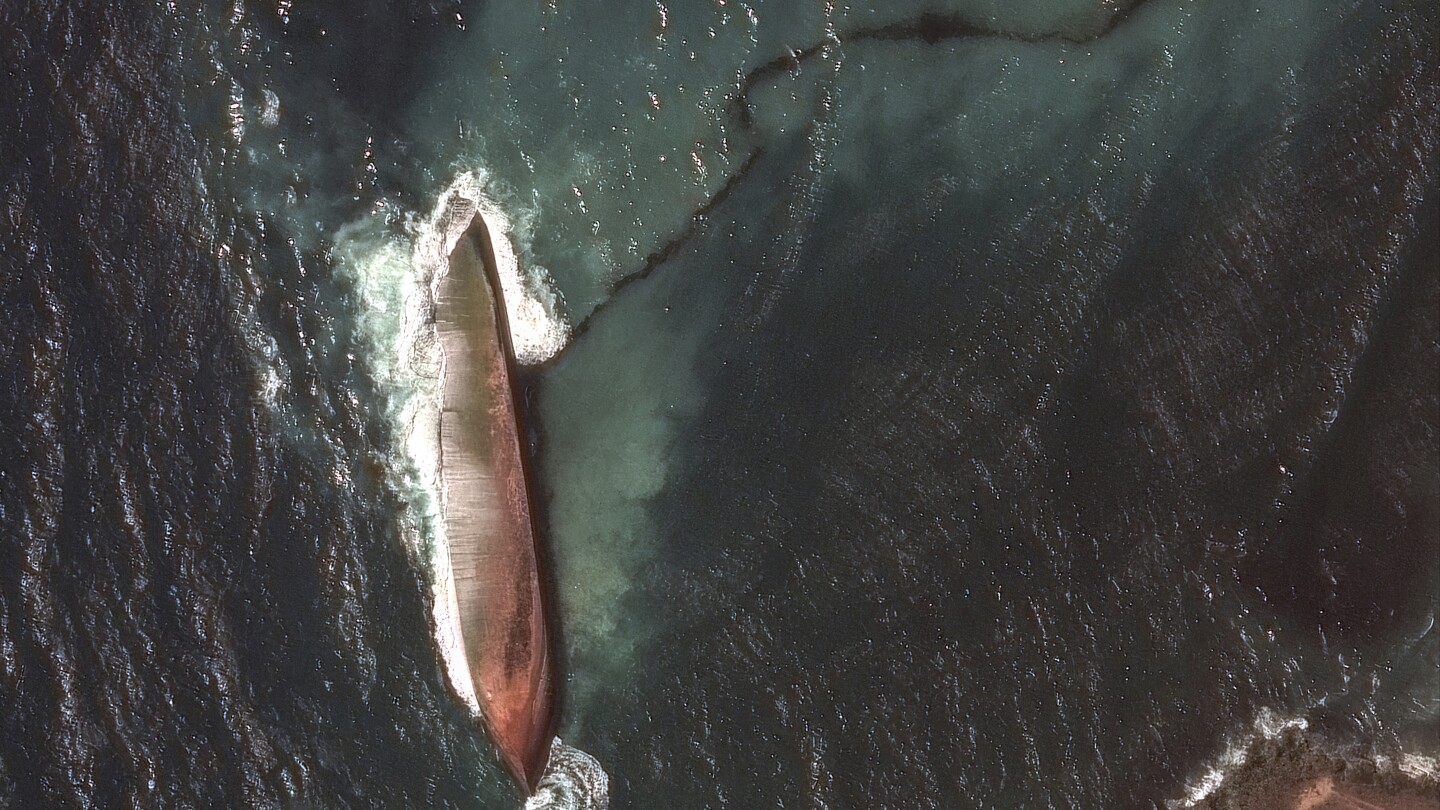 Trinidad hires foreign experts to help contain oil spill and remove capsized barge