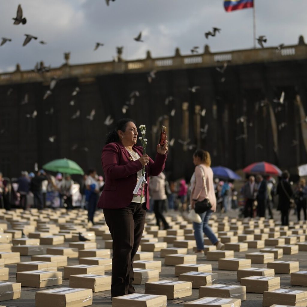 Colombians mourn the killings of hundreds of former rebel fighters and human rights leaders