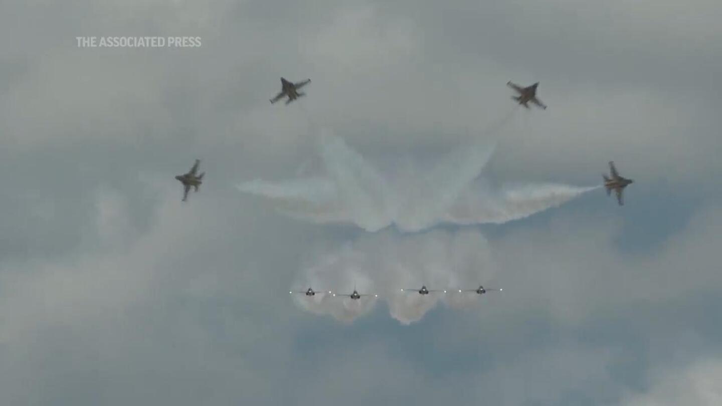 Singapore Airshow kicks off with aerial displays | AP News