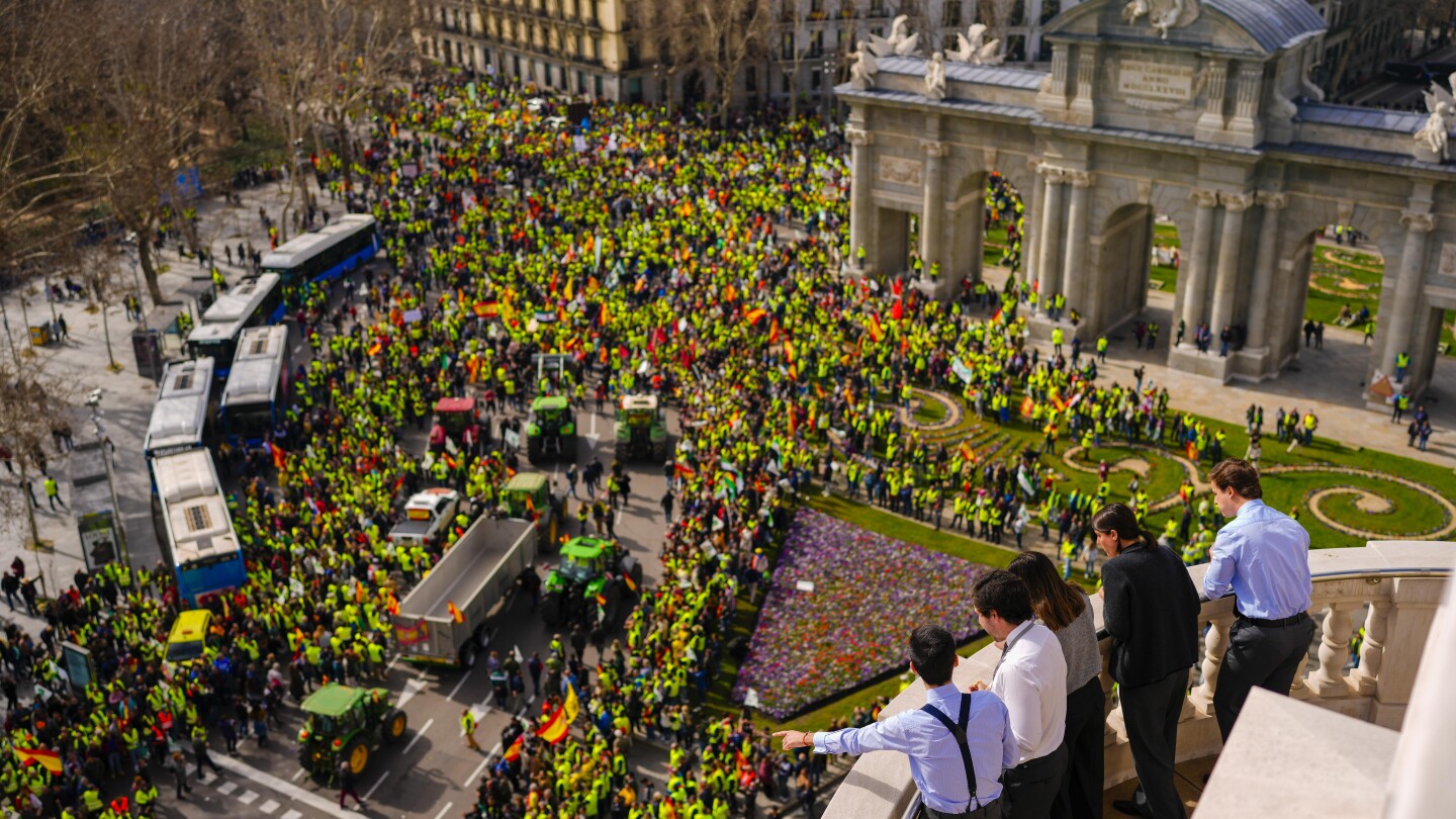 Thousands of farmers advance on Madrid for a major tractor protest over EU policies