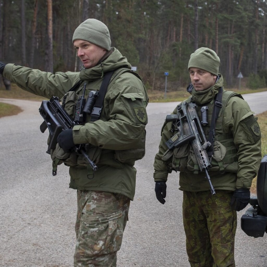 Lithuania to close 2 more checkpoints with Russian ally Belarus as tensions along the border rise