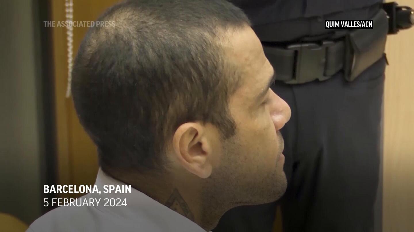 Soccer star Dani Alves found guilty of rape, sentenced to four and a half years in prison | AP News