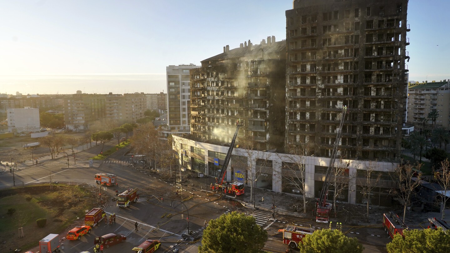 Rescuers search for 14 people missing after apartment block fire in eastern Spain. 4 confirmed dead