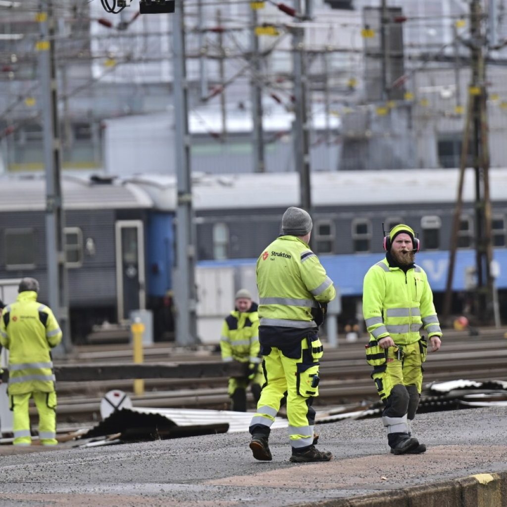 Scandinavian storm tears a roof off a Swedish train station and leaves ferries idle but no one hurt