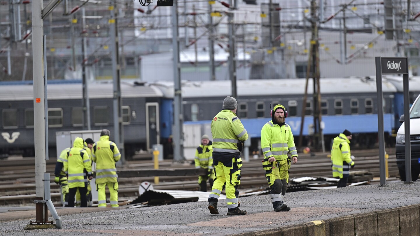 Scandinavian storm tears a roof off a Swedish train station and leaves ferries idle but no one hurt