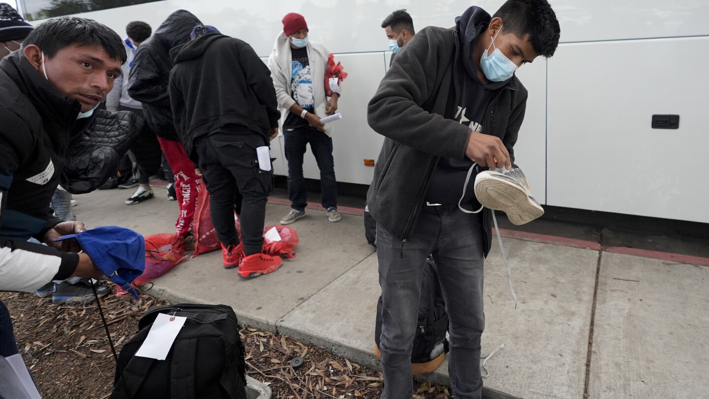 Border Patrol releases hundreds of migrants at a bus stop after San Diego runs out of aid money