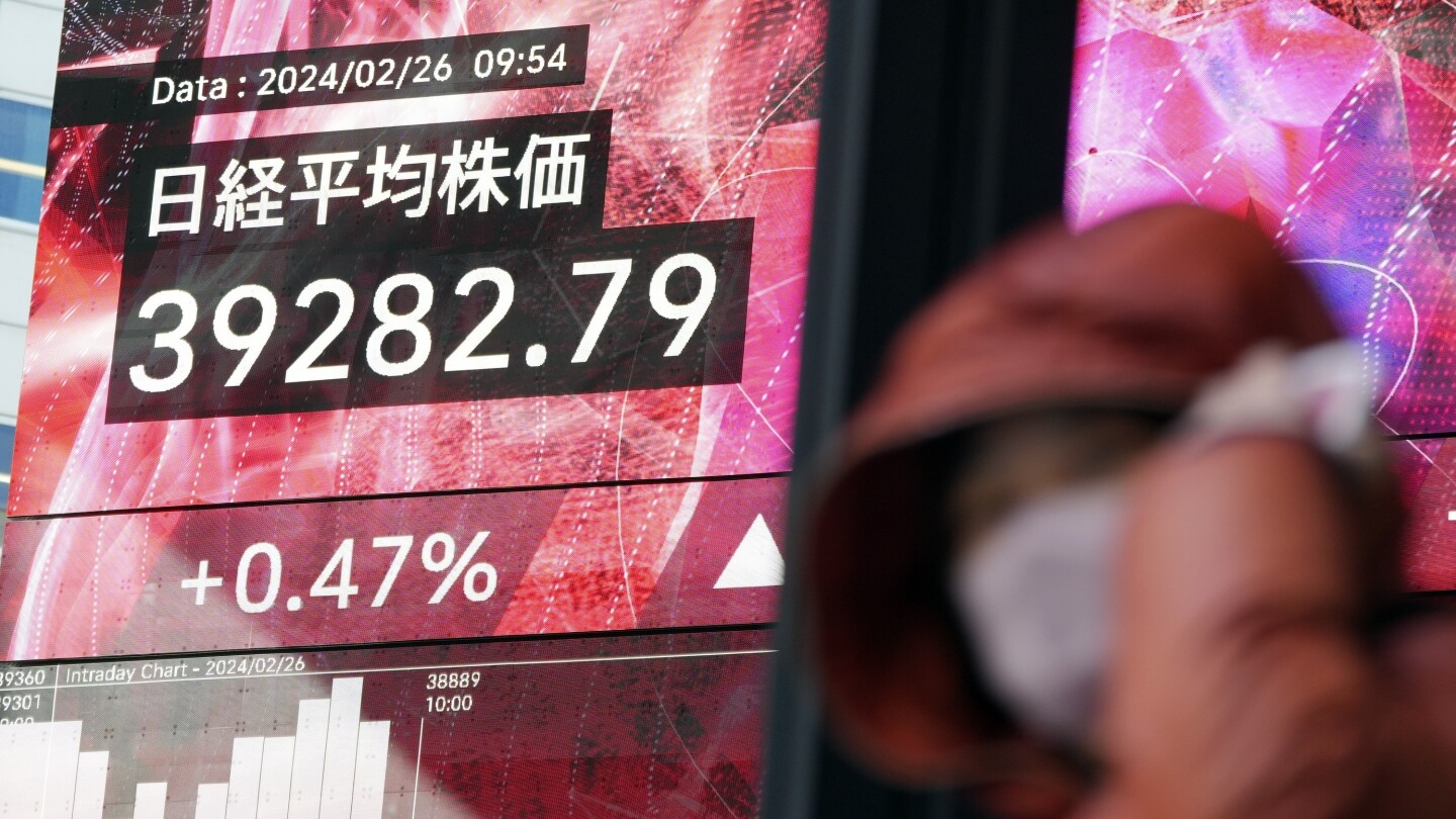 Stock market today: Asian shares mostly decline, while Tokyo again touches a record high