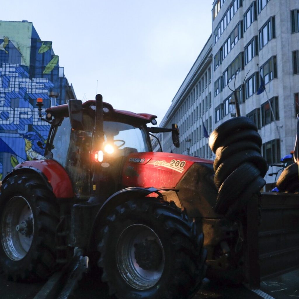 Farmers converge on the European Union’s headquarters in a fresh show of force