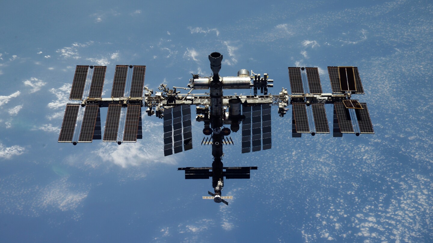 Russian space officials say air leak at International Space Station poses no danger to its crew